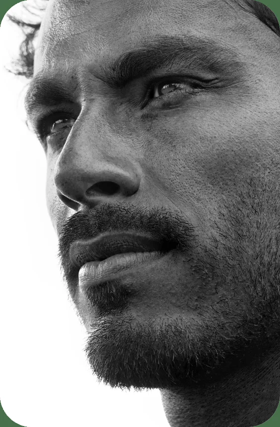 Black-and-white portrait of a confident man in profile
